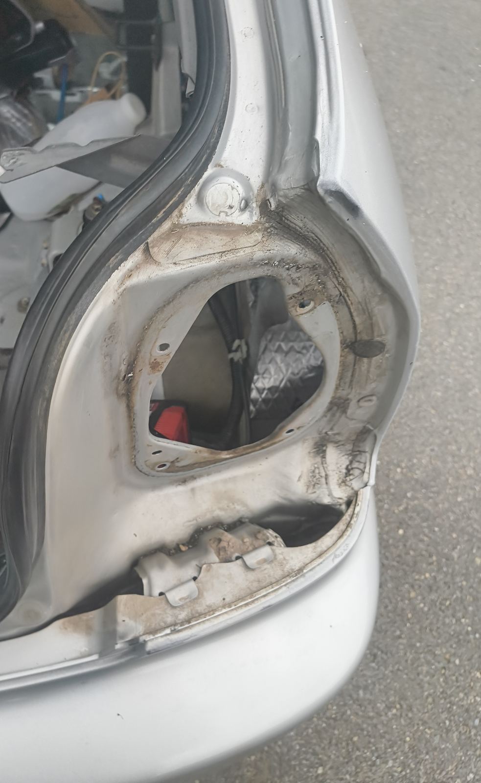 Taillight housing before moisture seal repair