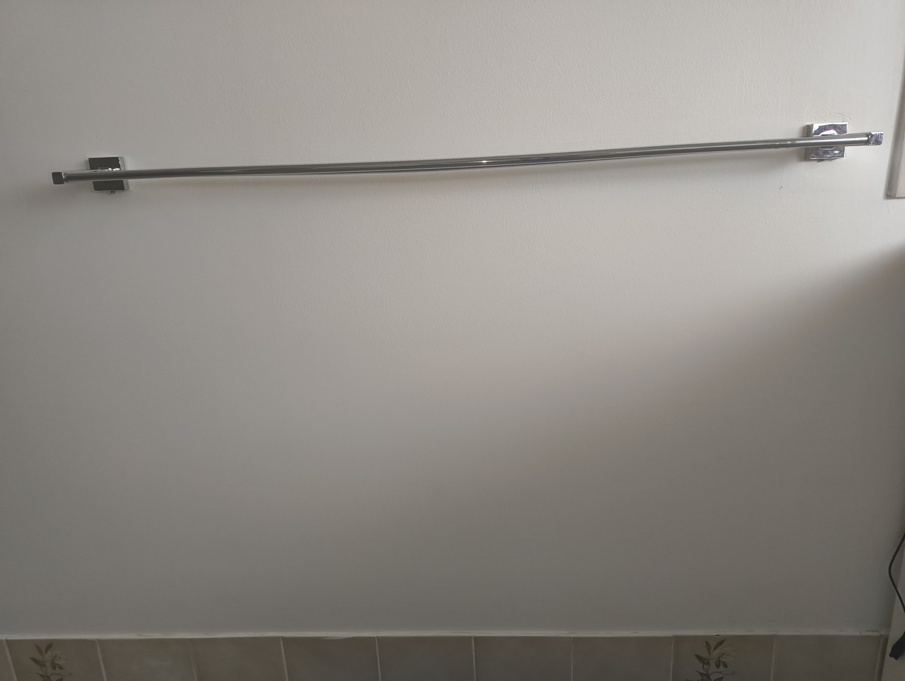 Towel rail wall after repair and repaint